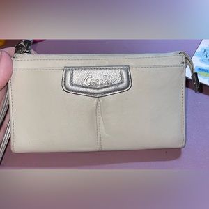 Coach | Cream / baby pink Wristlet